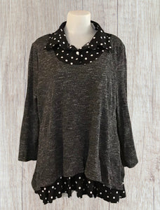 Cute tunic top with polka dot trim.