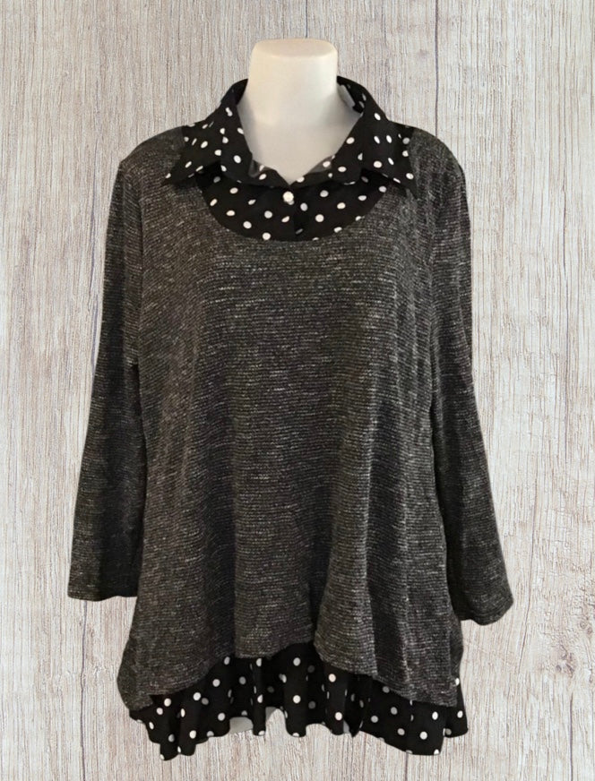 Cute tunic top with polka dot trim.