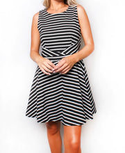 Load image into Gallery viewer, Black/white striped dress with back zipper and cut design on sides
